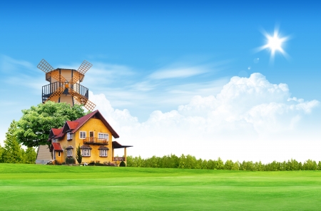 House on green field landscape with blue skyの写真素材