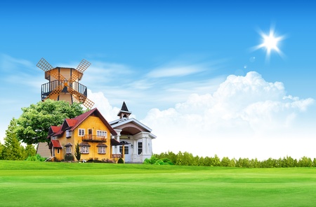 House on green field landscape with blue skyの写真素材
