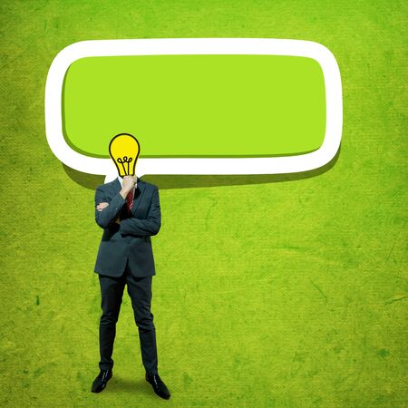 Business man with bulb head on the screen backgroundの写真素材