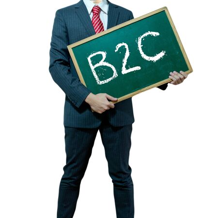 Business man holding board on the background with business wordの写真素材
