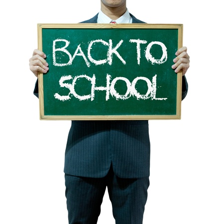 Business man holding blackboard on the background , Educationの写真素材