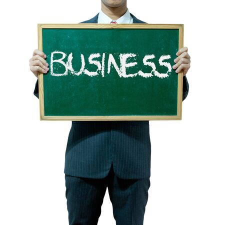 Business man holding blackboard on the background , Businessの写真素材