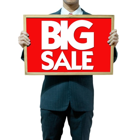 Business man holding board on the background , SALEの写真素材