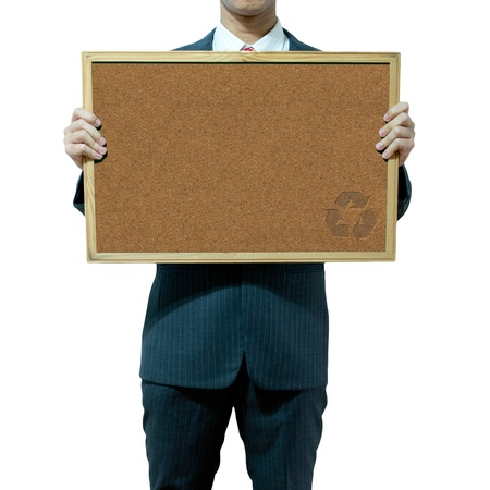 Business man holding cork board on the background の写真素材