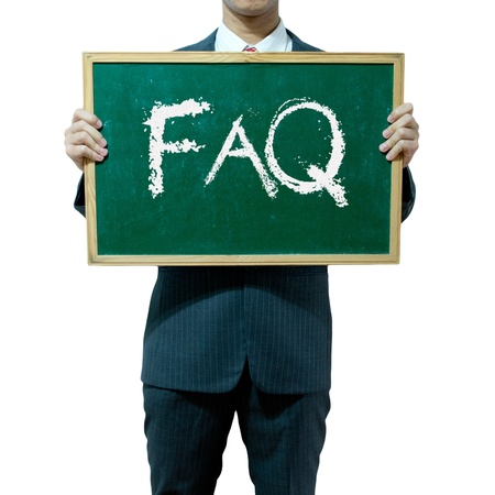 Business man holding blackboard on the background , FAQの写真素材