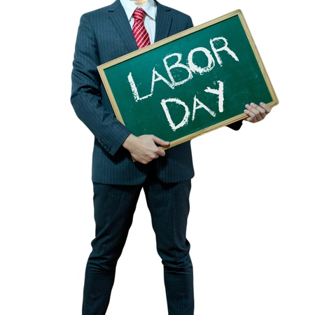Business man holding board on the background with business wordの写真素材