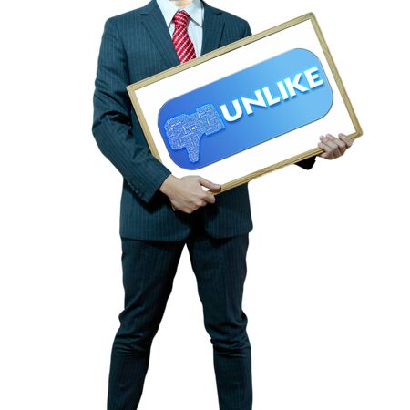 Business man holding board on the background with symbolの写真素材