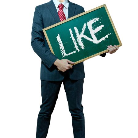 Business man holding board on the background with like wordの写真素材