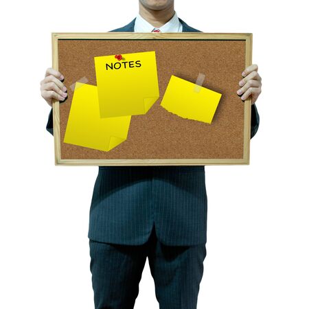 Business man holding cork board on the background の写真素材