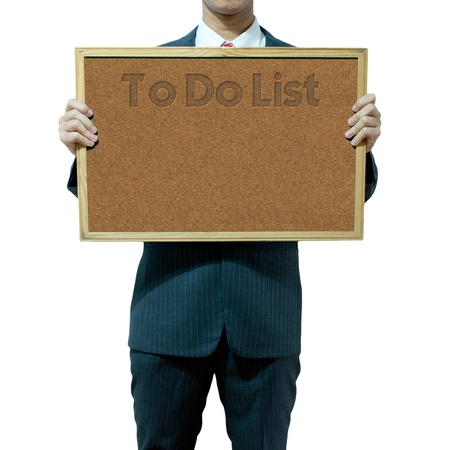 Business man holding cork board on the background の写真素材