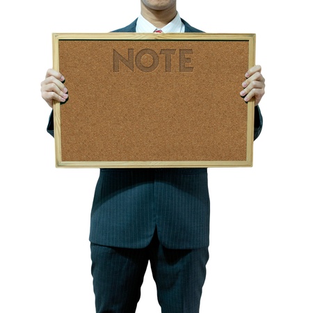 Business man holding cork board on the background の写真素材