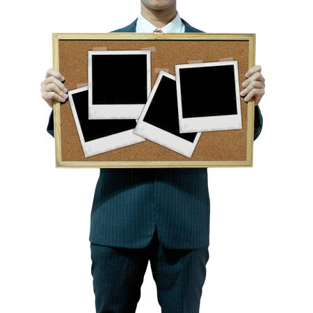 Business man holding cork board on the background の写真素材