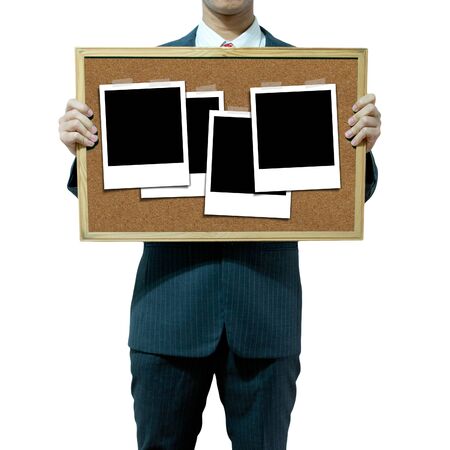 Business man holding cork board on the background の写真素材