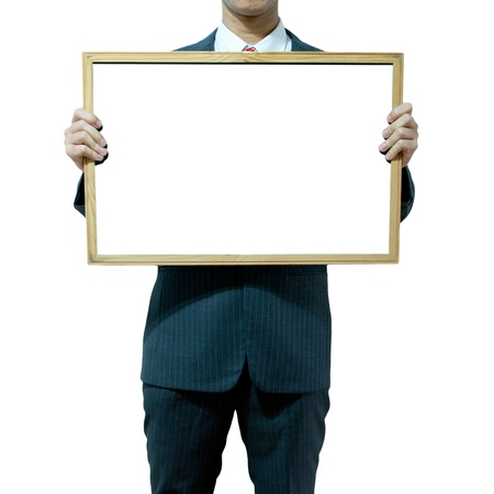 Business man holding board on the background の写真素材