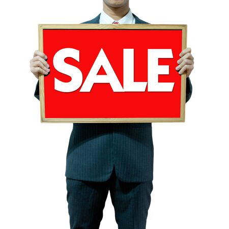 Business man holding board on the background , SALEの写真素材