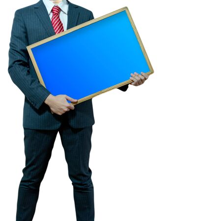 Business man holding black boardの写真素材