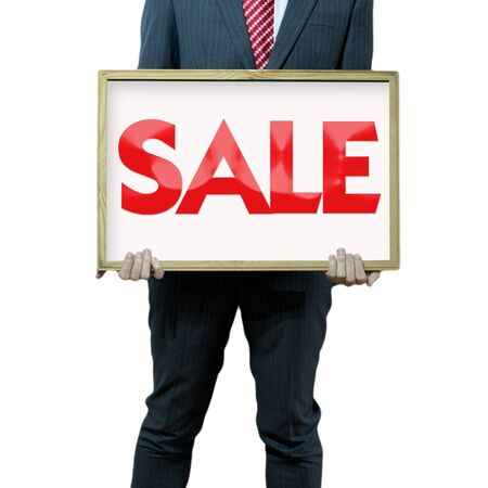 Business man holding black board sale promotionの写真素材