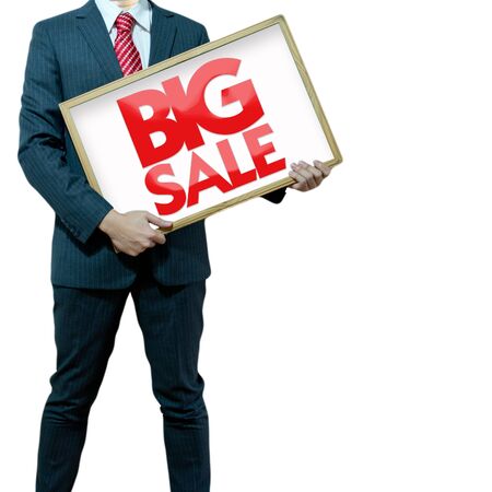 Business man holding black board sale promotionの写真素材