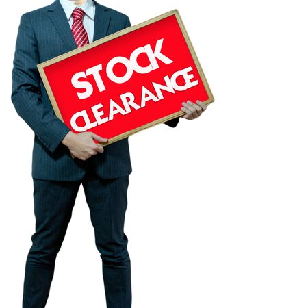 Business man holding black board sale promotionの写真素材