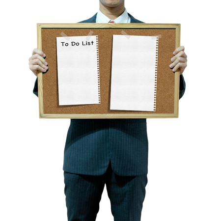 Business man holding cork board on the background の写真素材
