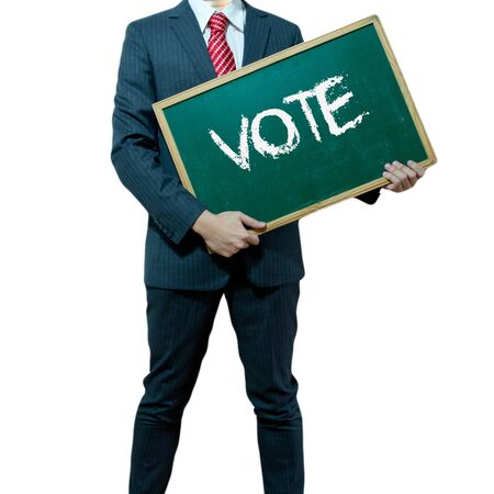 Business man holding board on the background with business word, Voteの写真素材