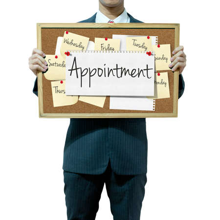 Business man holding board on the background, Appointmentの写真素材