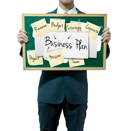 Business man holding board on the background, Business Plan conceptの写真素材