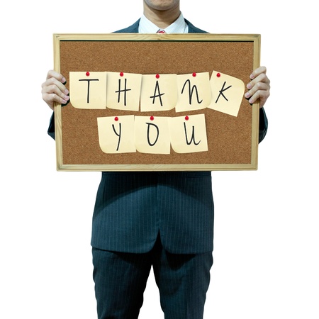 Business man holding board on the backgroundの写真素材