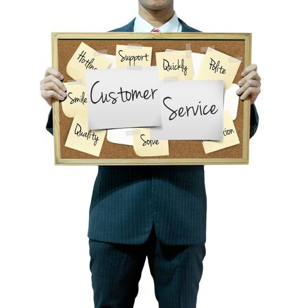 Business man holding board on the background, Customer Service conceptの写真素材