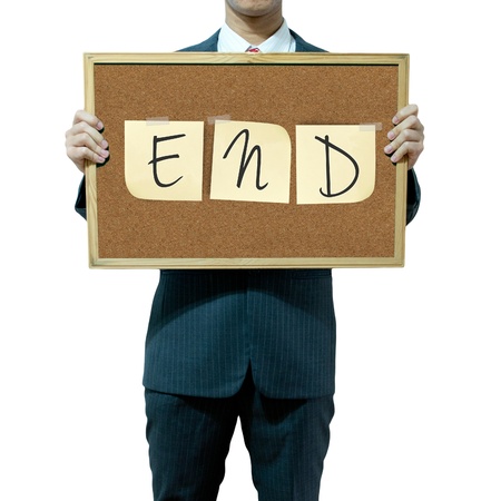 Business man holding cork board on the backgroundの写真素材