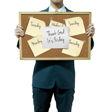 Business man holding cork board on the backgroundの写真素材