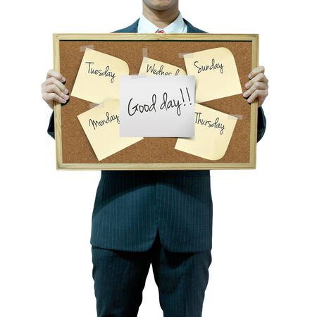 Business man holding cork board on the backgroundの写真素材