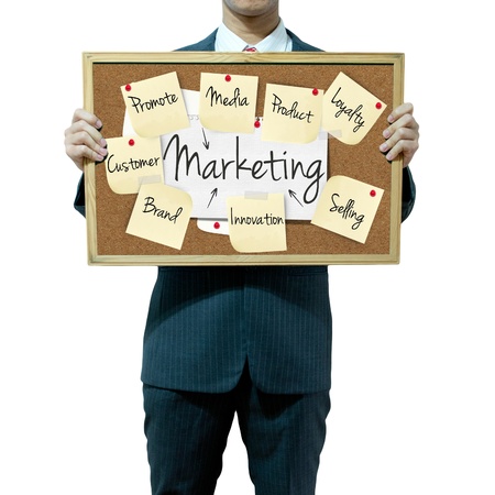 Business man holding board on the background, Marketing conceptの写真素材