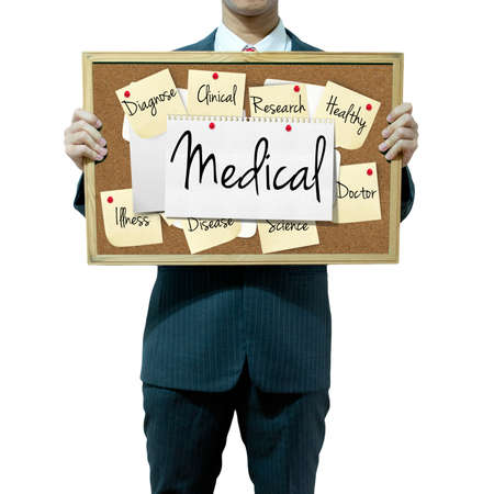 Business man holding board on the background, Medical conceptの写真素材