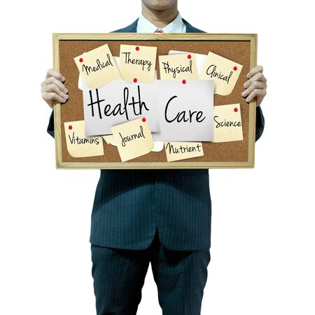 Business man holding board on the background, Medical conceptの写真素材