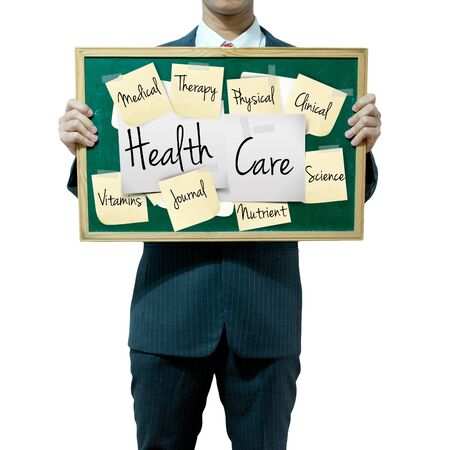 Business man holding board on the background, Medical conceptの写真素材
