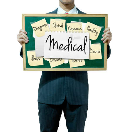 Business man holding board on the background, Medical conceptの写真素材