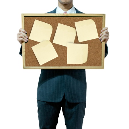 Business man holding cork board on the background の写真素材