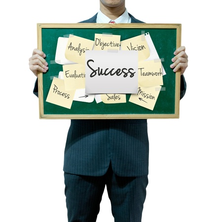 Business man holding board on the background, Success conceptの写真素材