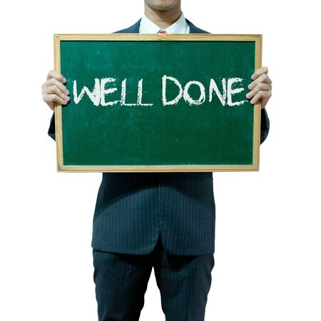 Business man holding board on the background, complimentsの写真素材