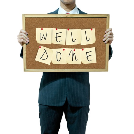Business man holding board on the background, complimentsの写真素材