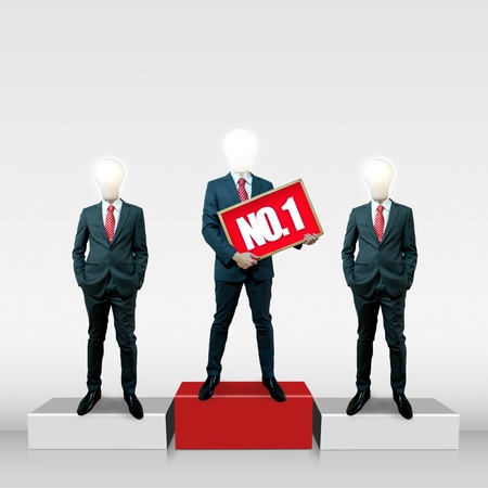 Business man with bulb head on the screen backgroundの写真素材