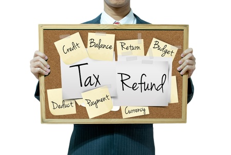 Business man holding board on the background, Tax Refundの写真素材