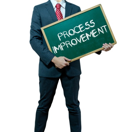 Business man holding board on the background, Process Improvementの写真素材