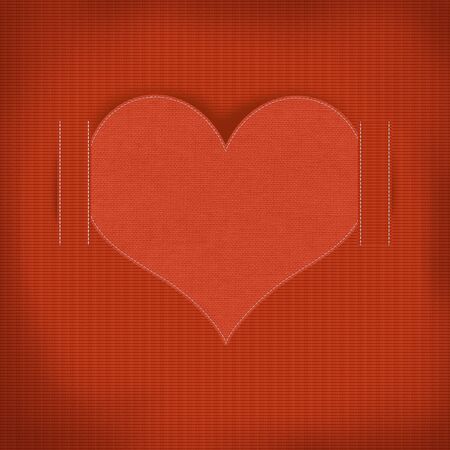 Heart sewing with white thread on the fabric texture backgroundの写真素材