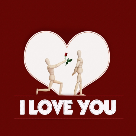 Wooden model handing over love rose to friend on Valentine dayの写真素材