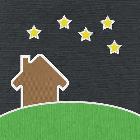 Landscape of green grass and home with stitch style on fabrix backgroundの写真素材