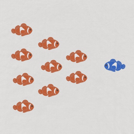 Fish leader on white background with stitch style, unique and diffrent business conceptの写真素材