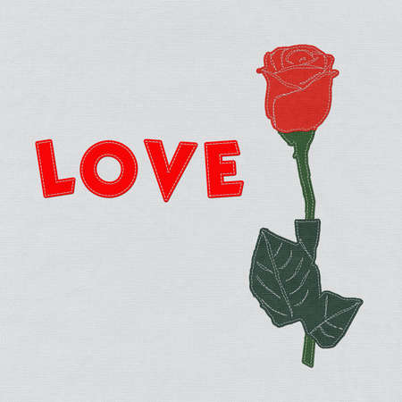 Red rose with stitch style on fabric backgroundの写真素材