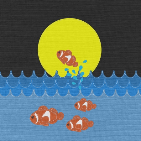 Fish under water with stitch style on fabric backgroundの写真素材